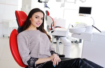 A relaxed young woman in a dentist chair Marietta GA