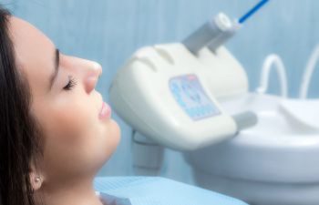 Sedated woman in a dental chair before treatment at dentistry in Marietta GA.