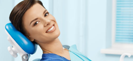 Relaxed smiling woman in a dental chair