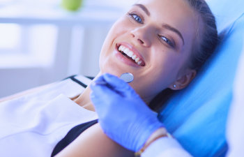 woman happy in the dentist chair